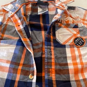 A Boys Rock 12 months Button down short sleeve shirt.